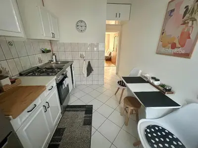 Kuchnia lub aneks kuchenny w obiekcie Apartament T Joanna blisko dworca