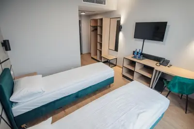 Łóżko lub łóżka w pokoju w obiekcie Centrum Szkoleniowo - Rekreacyjne '5 poziom'