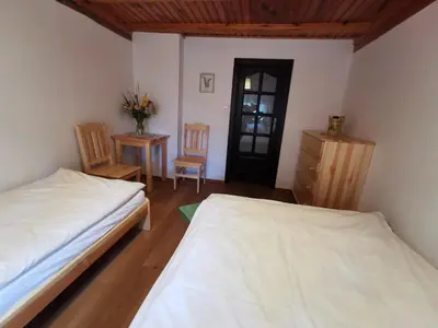 Łóżko lub łóżka w pokoju w obiekcie Zielone Wzgórze