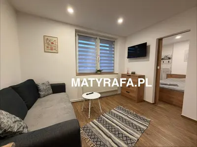 Telewizja i/lub zestaw kina domowego w obiekcie ApartmentsByMatyrafa-XIV