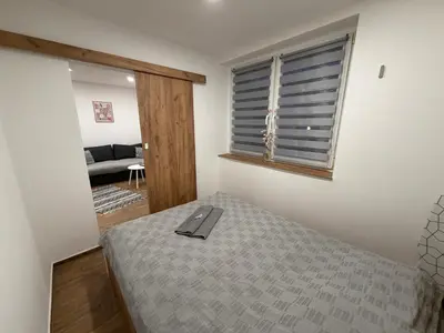 Łóżko lub łóżka w pokoju w obiekcie ApartmentsByMatyrafa-XIV
