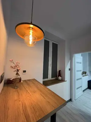 Łóżko lub łóżka w pokoju w obiekcie Apartament Centrum Kłodnicka