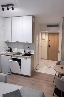 Kuchnia lub aneks kuchenny w obiekcie Apartments Rajska 77