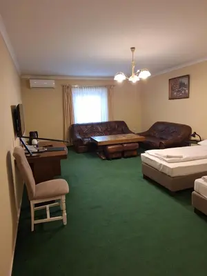 Łóżko lub łóżka w pokoju w obiekcie Hotel Malwa