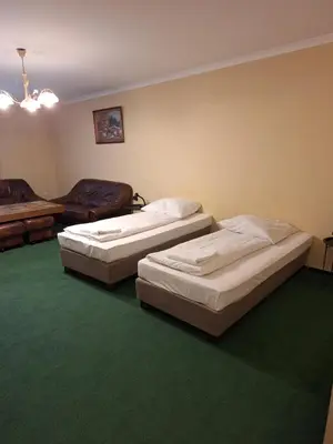 Łóżko lub łóżka w pokoju w obiekcie Hotel Malwa
