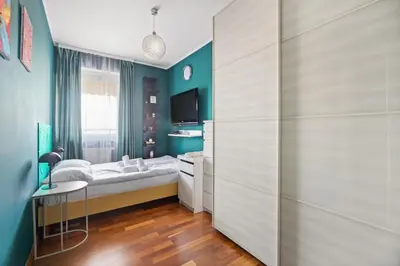 Telewizja i/lub zestaw kina domowego w obiekcie Śliczna 5 by Homeprime