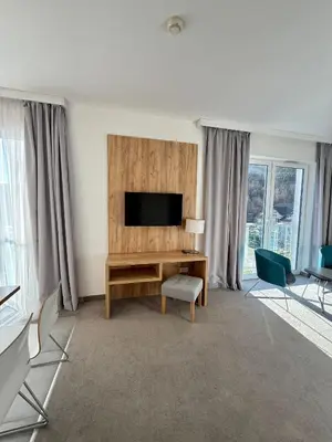 Telewizja i/lub zestaw kina domowego w obiekcie Aparthotel Apartamentu Czarna Góra 121