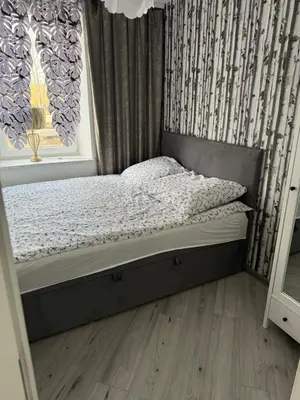 Łóżko lub łóżka w pokoju w obiekcie Apartament Zuza