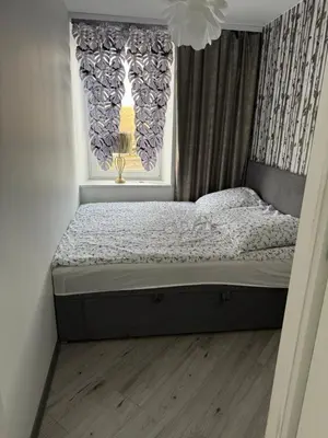 Łóżko lub łóżka w pokoju w obiekcie Apartament Zuza
