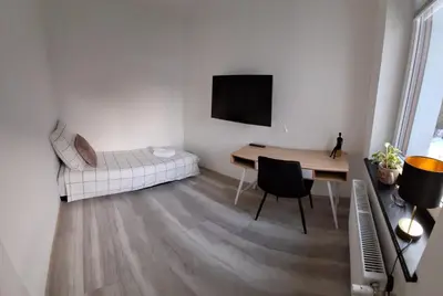 Telewizja i/lub zestaw kina domowego w obiekcie Na Skraju Jutra