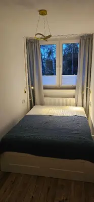 Łóżko lub łóżka w pokoju w obiekcie Apartament na Wojciecha