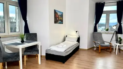 Łóżko lub łóżka w pokoju w obiekcie Apartamenty w Starej Wieży by LibertaRent