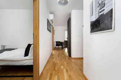 Łóżko lub łóżka w pokoju w obiekcie Spacious Apartment in Wrocław with Large Terrace and 2 Parking Spaces by Noclegi Renters