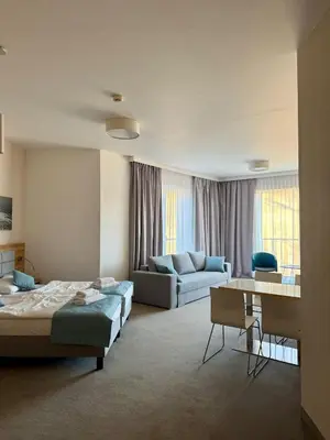 Łóżko lub łóżka w pokoju w obiekcie Aparthotel Apartamenty Czarna Góra 111