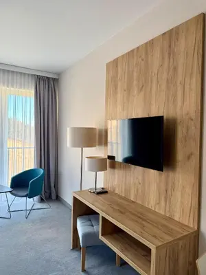 Telewizja i/lub zestaw kina domowego w obiekcie Aparthotel Apartamenty Czarna Góra 111