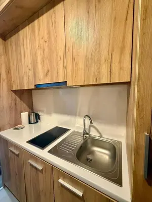 Kuchnia lub aneks kuchenny w obiekcie Aparthotel Apartamenty Czarna Góra 204