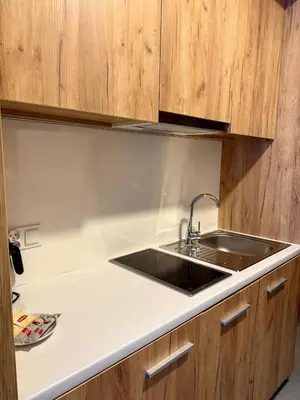 Kuchnia lub aneks kuchenny w obiekcie Aparthotel Apartamenty Czarna Góra 204