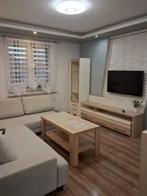 Telewizja i/lub zestaw kina domowego w obiekcie Przytulny apartament