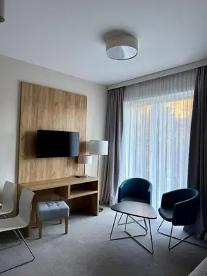Telewizja i/lub zestaw kina domowego w obiekcie Aparthotel Apartamenty Czarna Góra 0101