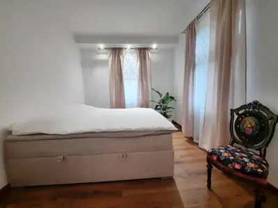 Łóżko lub łóżka w pokoju w obiekcie Cozy Zdrój