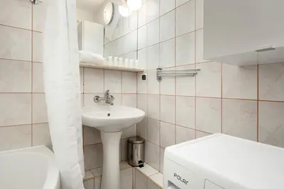 Łazienka w obiekcie Bright & Spacious Apartment for 6 People with the River View by Noclegi Reenters