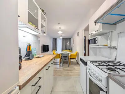 Kuchnia lub aneks kuchenny w obiekcie Powstańców Śląskich Homely Apartment by BookingHost