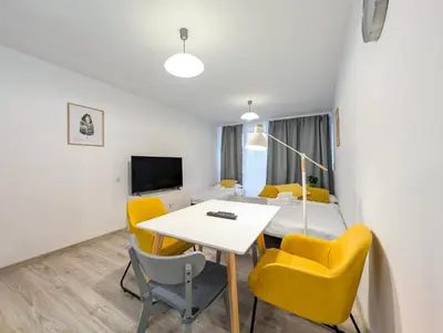 Telewizja i/lub zestaw kina domowego w obiekcie Powstańców Śląskich Homely Apartment by BookingHost
