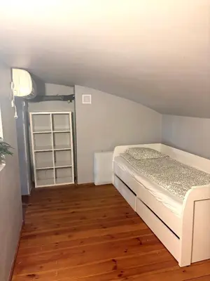 Łóżko lub łóżka w pokoju w obiekcie AH Apartament Wroclavia