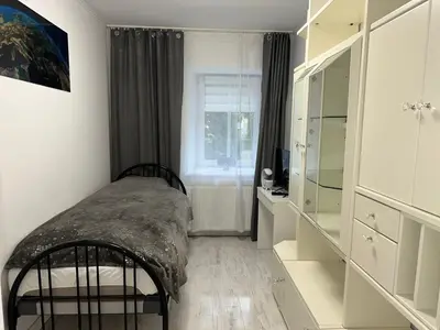 Łóżko lub łóżka w pokoju w obiekcie Noclegi Gracja