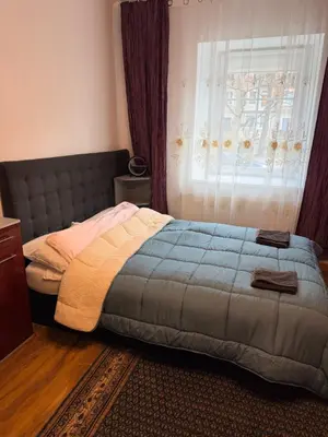 Łóżko lub łóżka w pokoju w obiekcie Noclegi Gracja