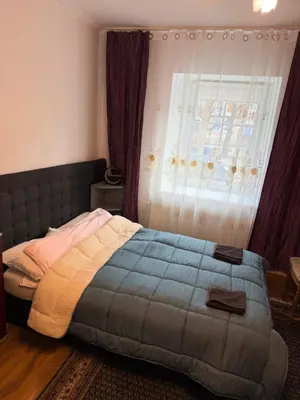 Łóżko lub łóżka w pokoju w obiekcie Noclegi Gracja