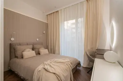 Łóżko lub łóżka w pokoju w obiekcie Luxury Apartment Near Center
