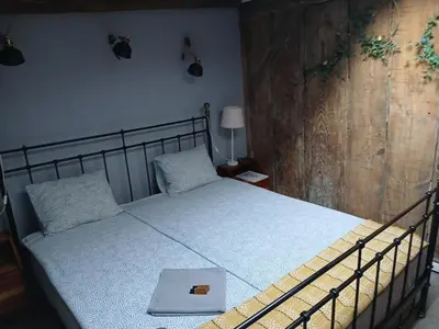 Łóżko lub łóżka w pokoju w obiekcie Italiano Vero