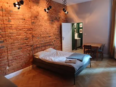 Łóżko lub łóżka w pokoju w obiekcie Italiano Vero
