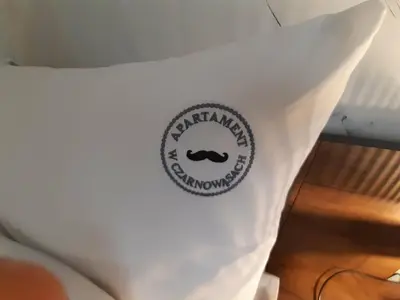 Łóżko lub łóżka w pokoju w obiekcie Apartament w Czarnowąsach 3