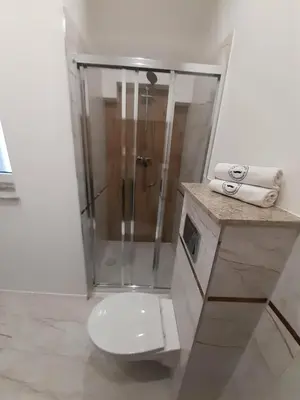 Łazienka w obiekcie Apartament w Czarnowąsach 3