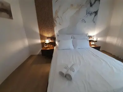 Łóżko lub łóżka w pokoju w obiekcie Apartament w Czarnowąsach 3
