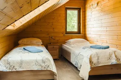 Łóżko lub łóżka w pokoju w obiekcie Agroturystyka Monte Luna - domki