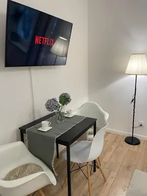 Telewizja i/lub zestaw kina domowego w obiekcie Apartament przy Sądzie