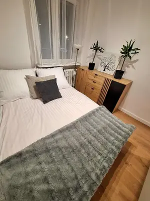 Łóżko lub łóżka w pokoju w obiekcie Apartament Polna 21