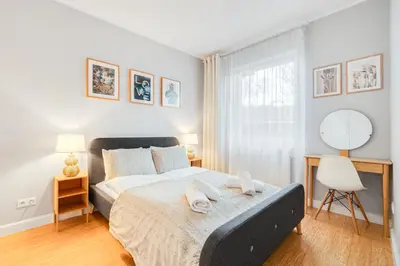 Łóżko lub łóżka w pokoju w obiekcie Hubska 62B by Homeprime