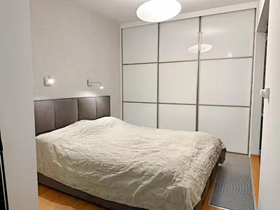Łóżko lub łóżka w pokoju w obiekcie Mieszkanie 60m2 z balkonem na Sylwestra w centrum Wrocławia!