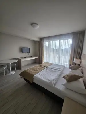 Łóżko lub łóżka w pokoju w obiekcie Czarna Góra Apartament Solden 33