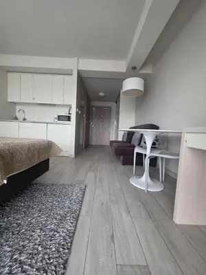 Łóżko lub łóżka w pokoju w obiekcie Czarna Góra Apartament Solden 33