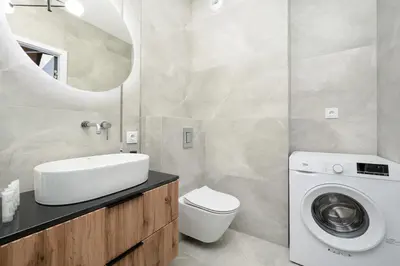 Łazienka w obiekcie Luxury Sky Jagodno Apartment with Jacuzzi Parking & Terrace by Renters Prestige
