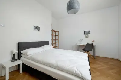 Łóżko lub łóżka w pokoju w obiekcie Bright Apartment Plac Muzealny in Wrocław Perfect for Remote Work by Noclegi Renters