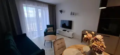 Telewizja i/lub zestaw kina domowego w obiekcie Apartman A9 - Zieleniec