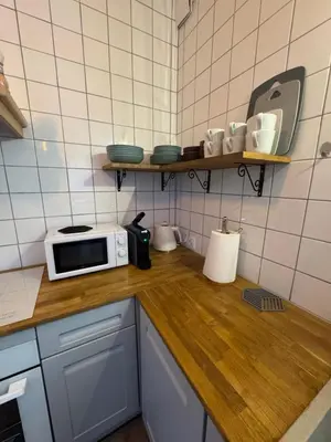 Kuchnia lub aneks kuchenny w obiekcie KatyHome Legnica