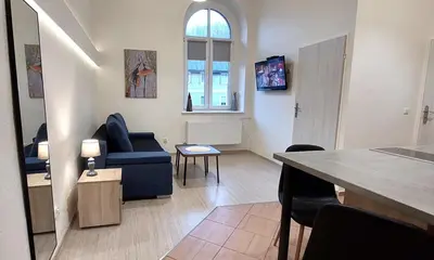 Telewizja i/lub zestaw kina domowego w obiekcie Apartament Pierwszy Maj