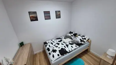 Łóżko lub łóżka w pokoju w obiekcie Apartament w Rynku
